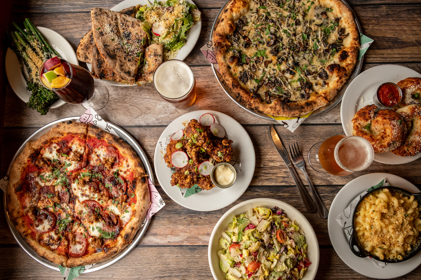 a pizza with many different types of food on a plate