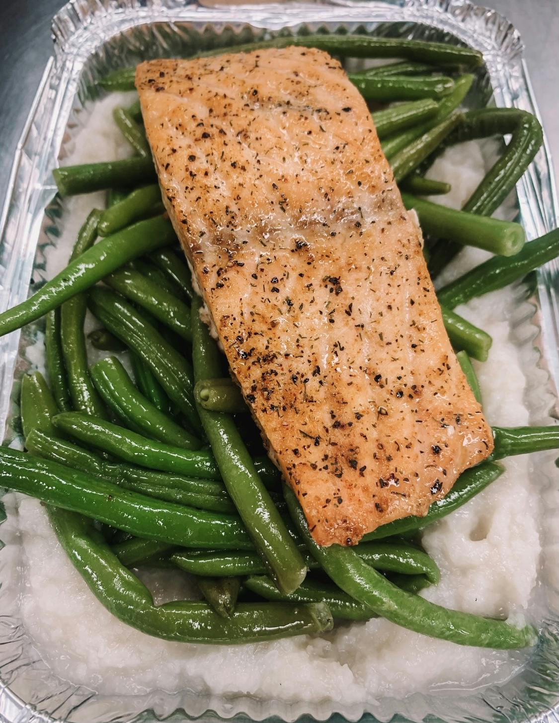 salmon over mashed cauliflower with green beans