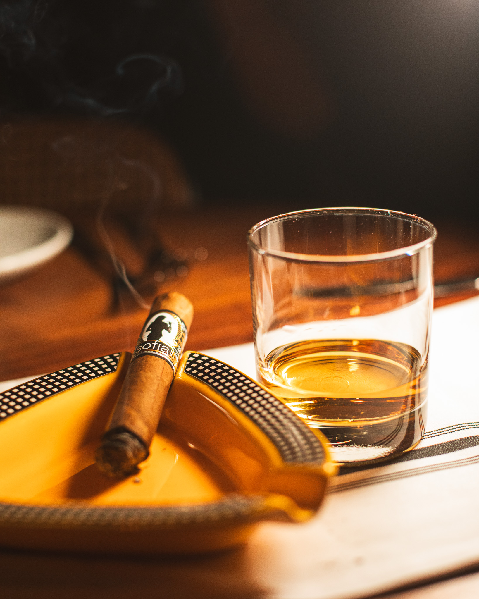a vase filled with flowers sitting on a table