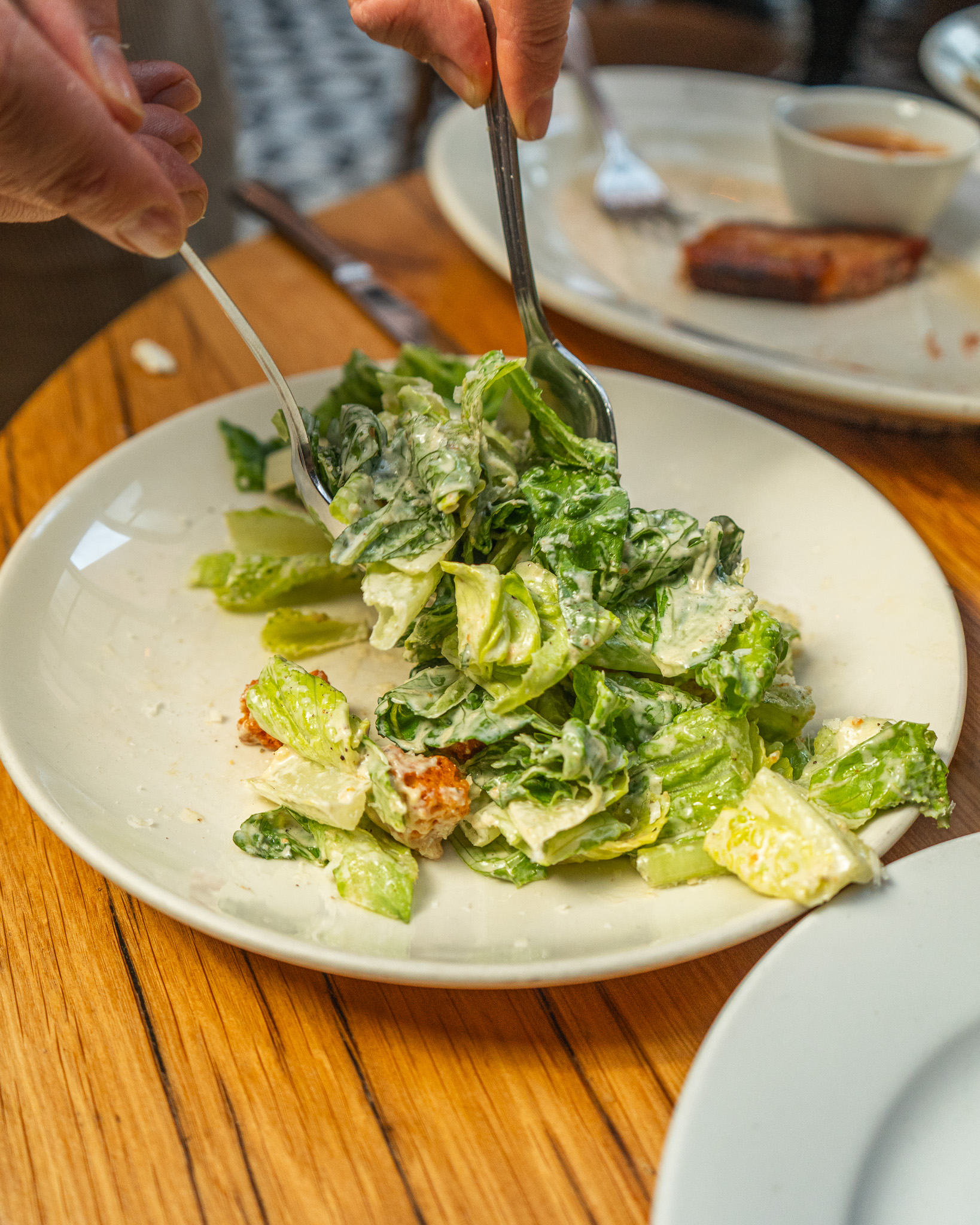 Sides get ordered as an obligation and eaten as an afterthought.