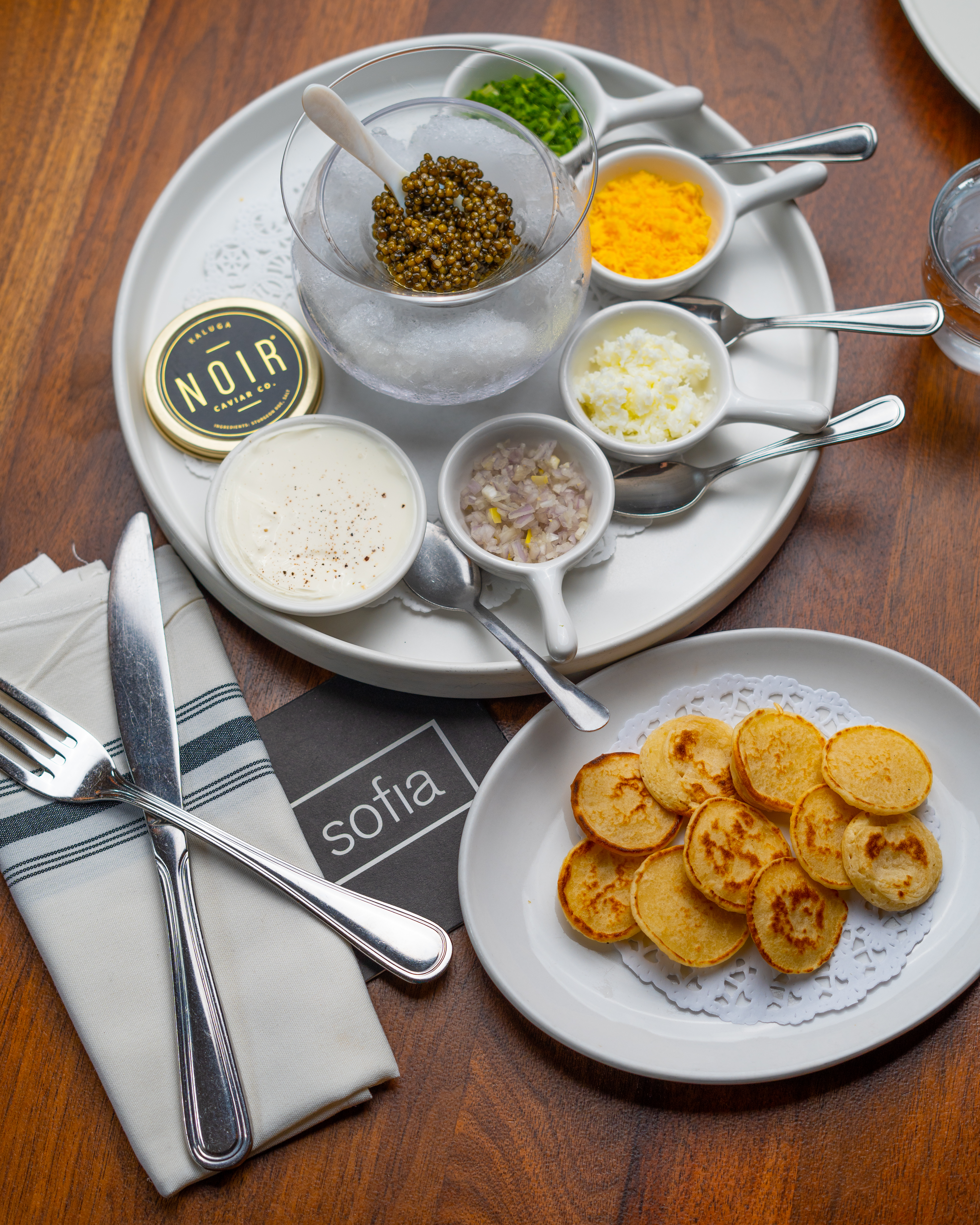 a plate of breakfast food is sitting on a table