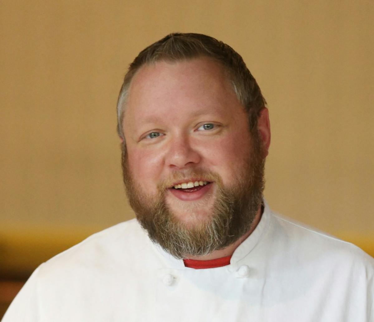 a man smiling for the camera