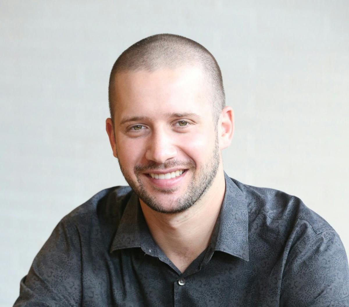 a man smiling for the camera