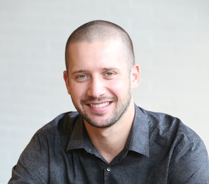 a man smiling for the camera