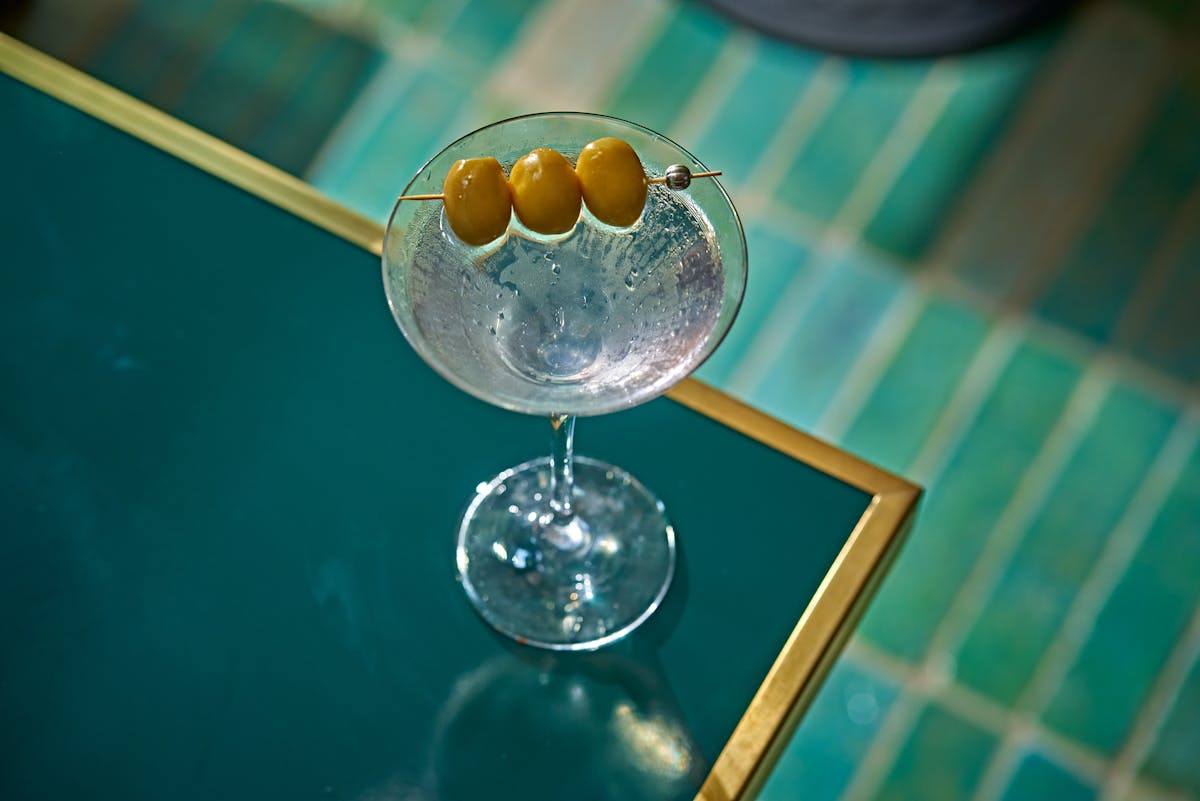 a martini with olives