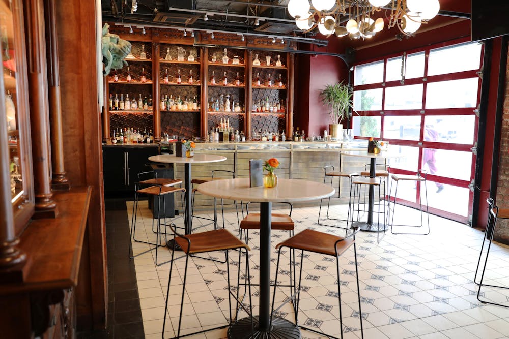 a dining room table in front of a window
