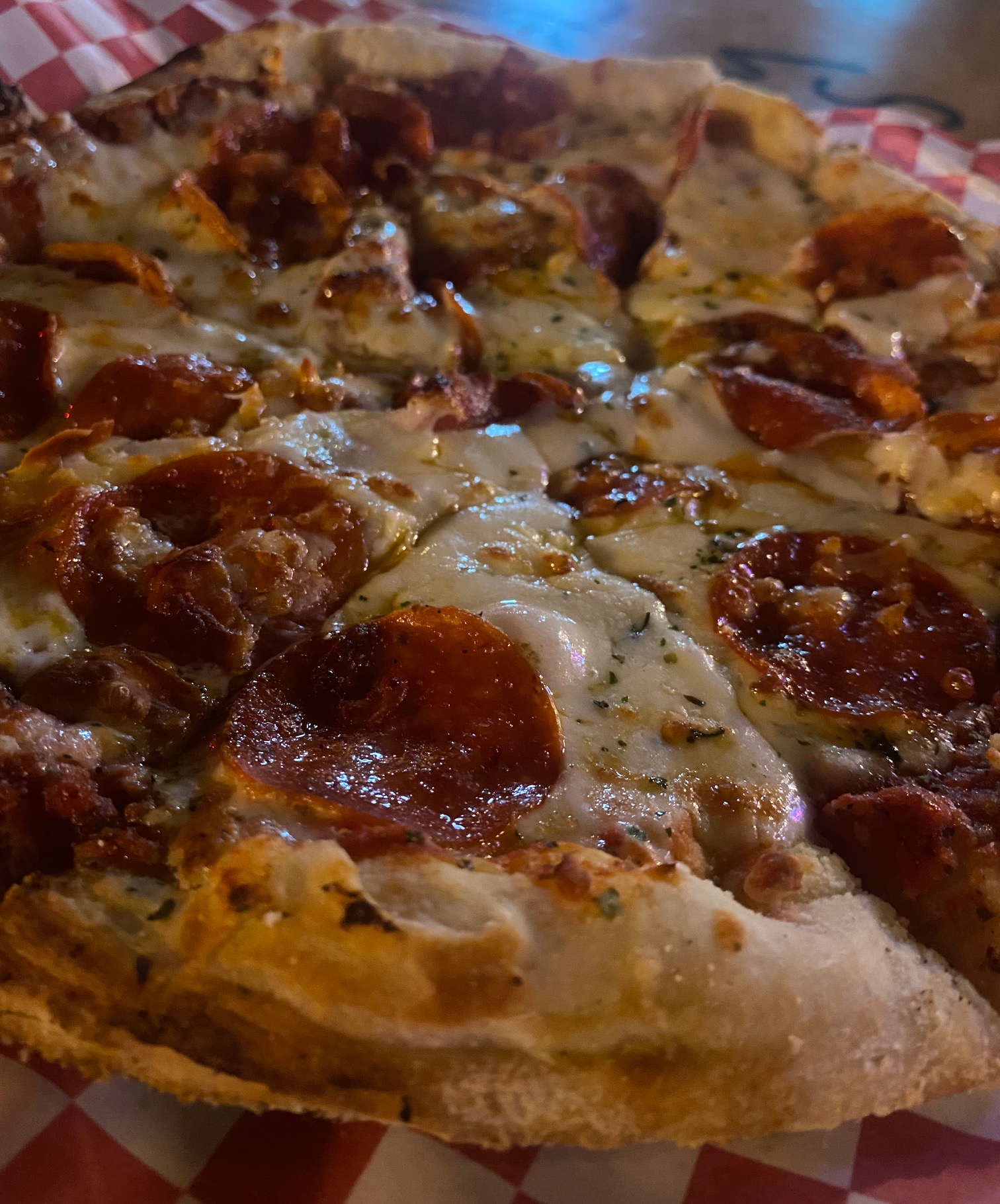 a close up of a slice of pizza