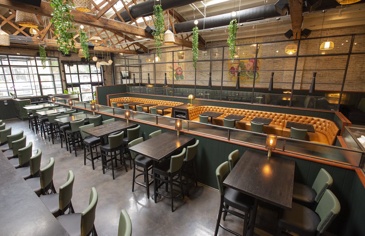 a kitchen with a table in a restaurant