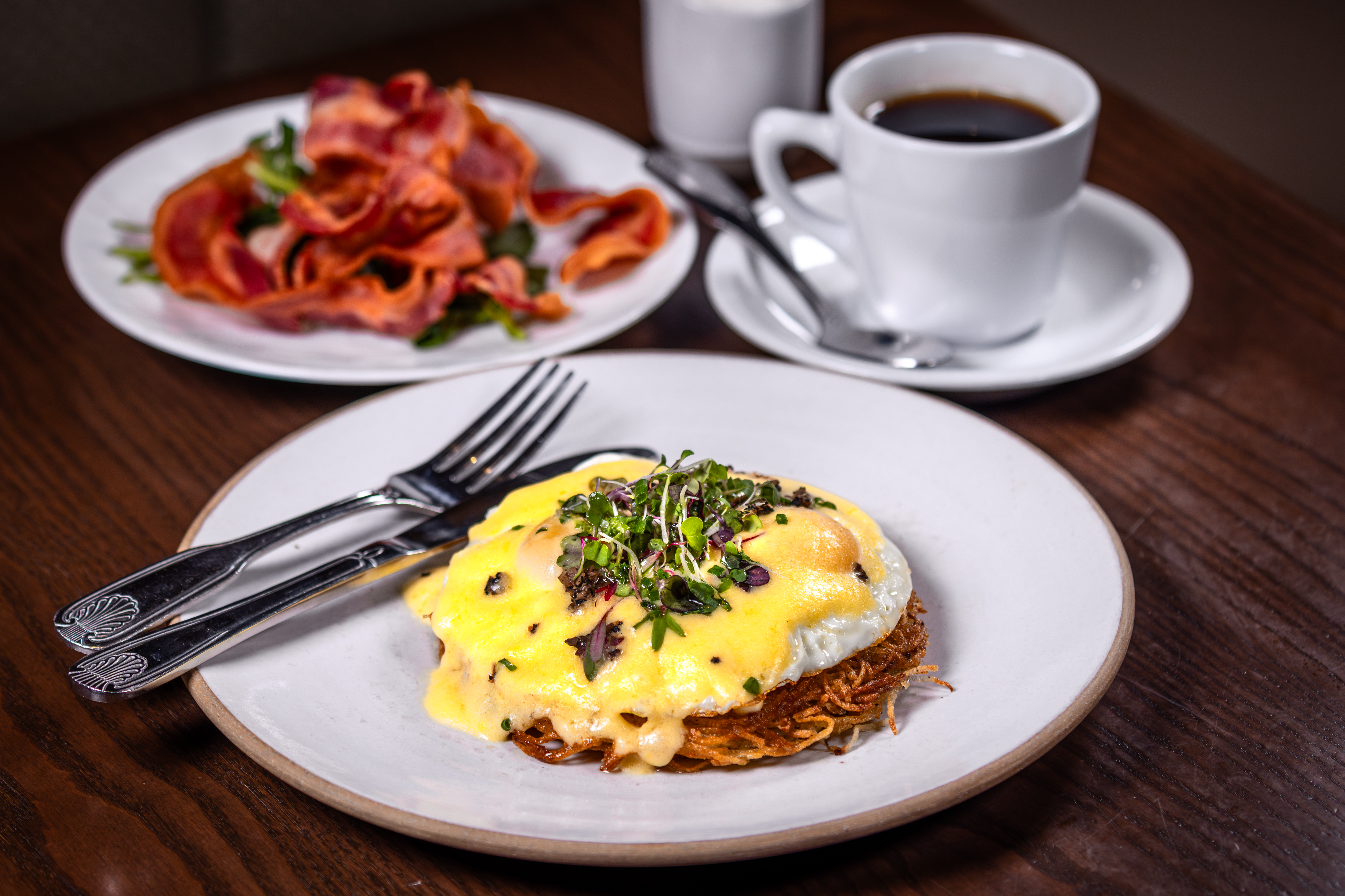 Breakfast layout including bacon, eggs and a coffee from Sugarcane, which is a restaurant based in The Venetian Hotel in Las Vegas.
