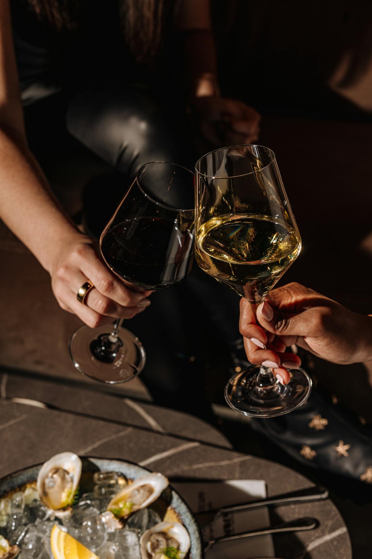 a woman holding a glass of wine