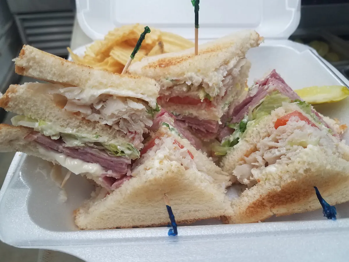 a sandwich cut in half on a plate