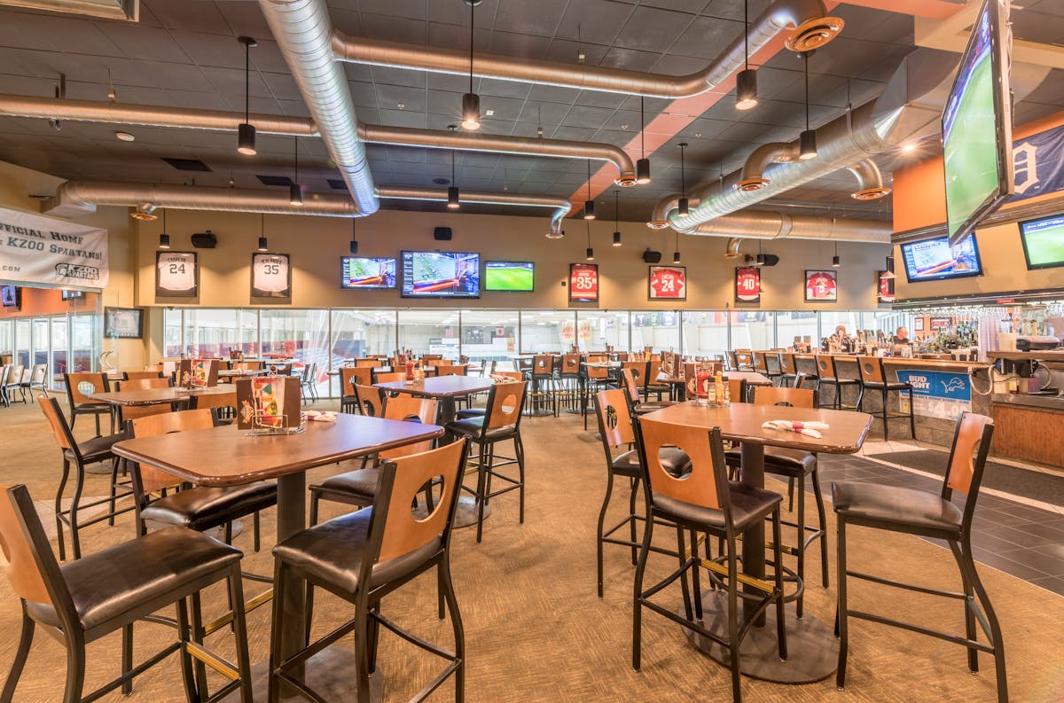 a large room filled with tables and chairs