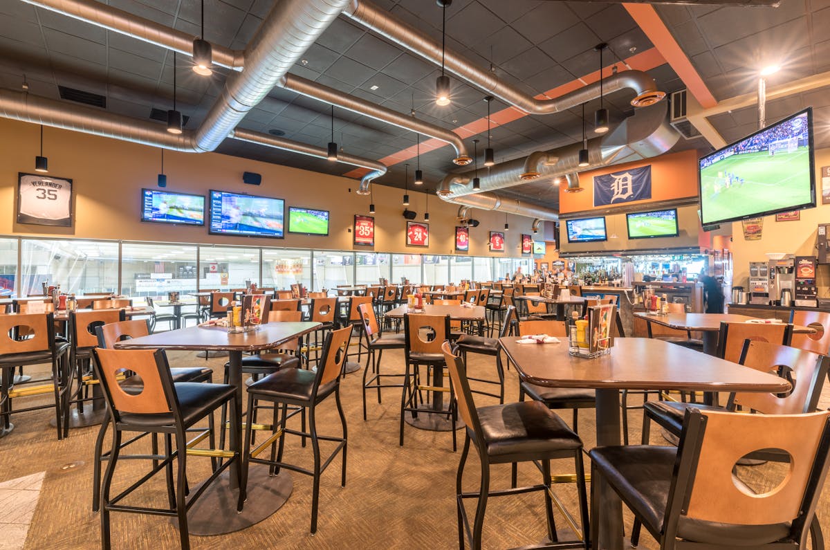 a large room filled with tables and chairs