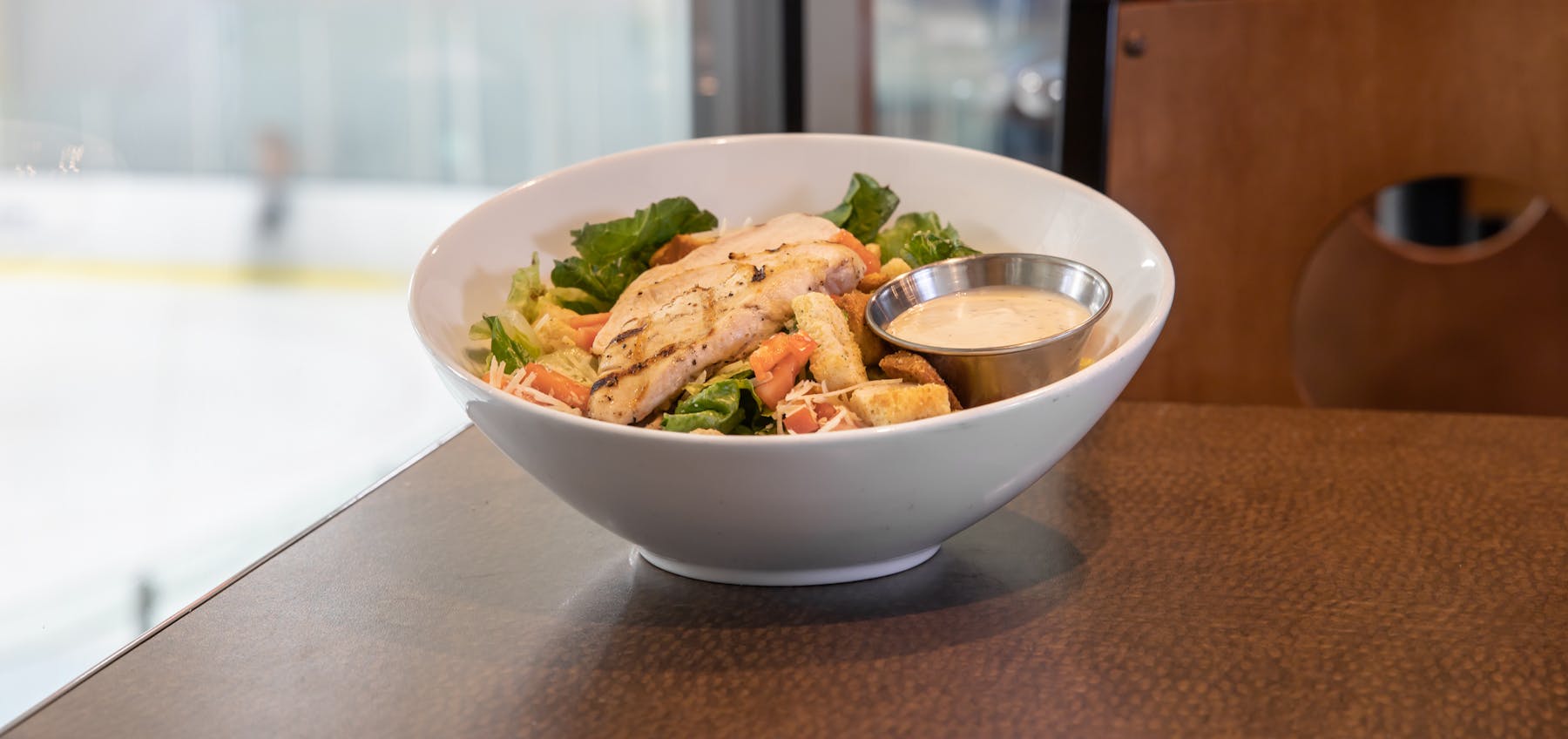a bowl of food with broccoli