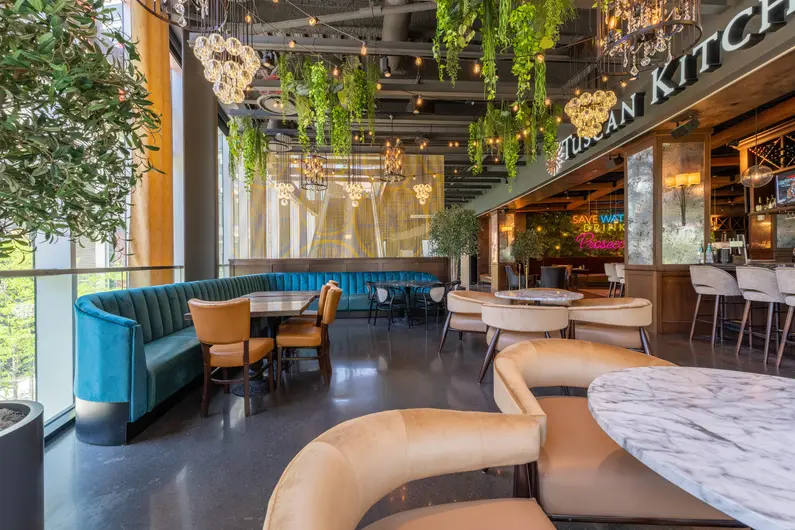 a restaurant with tables and chairs