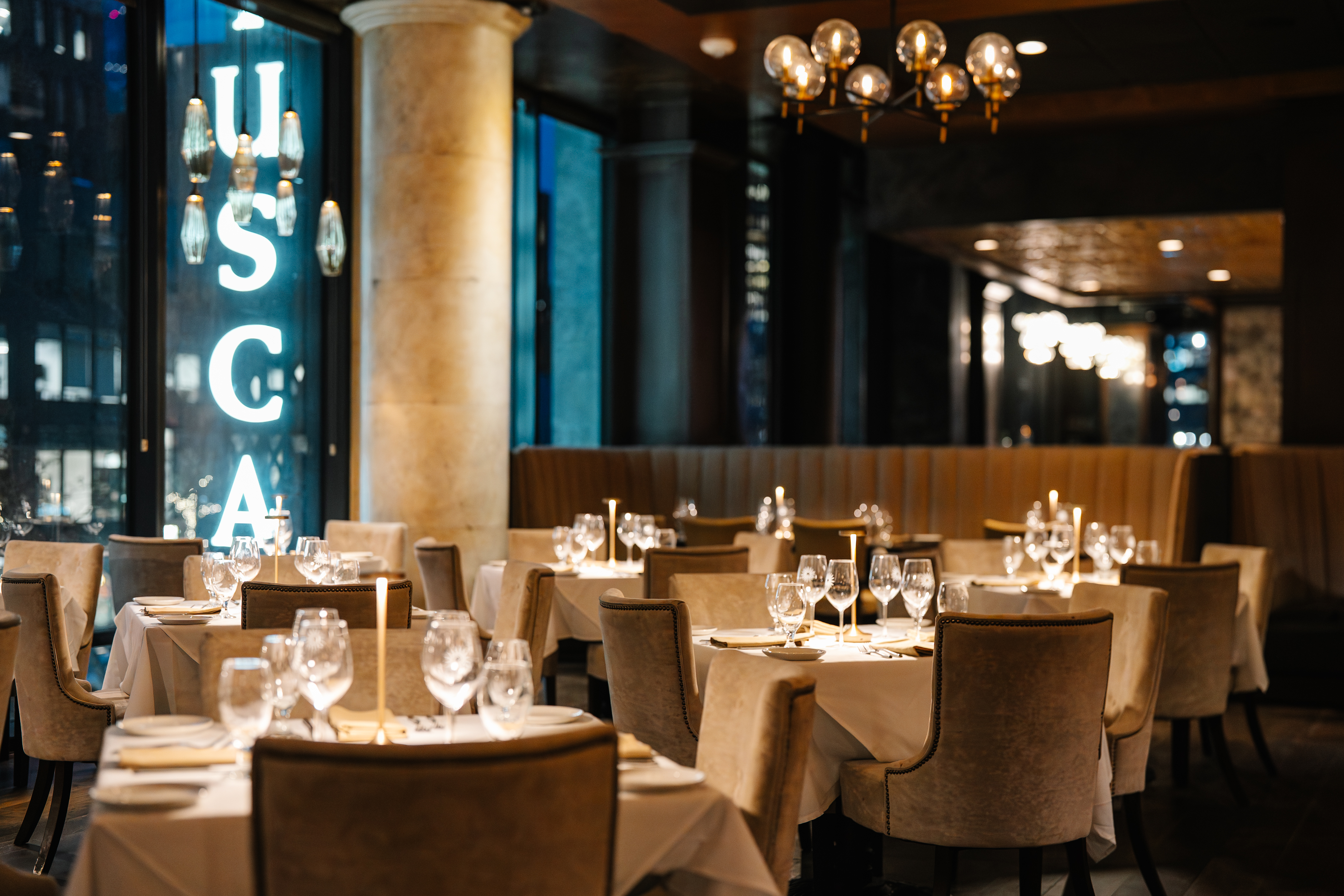 a restaurant with tables and chairs