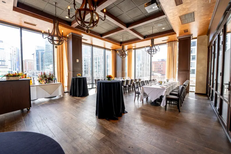 a room with tables and chairs