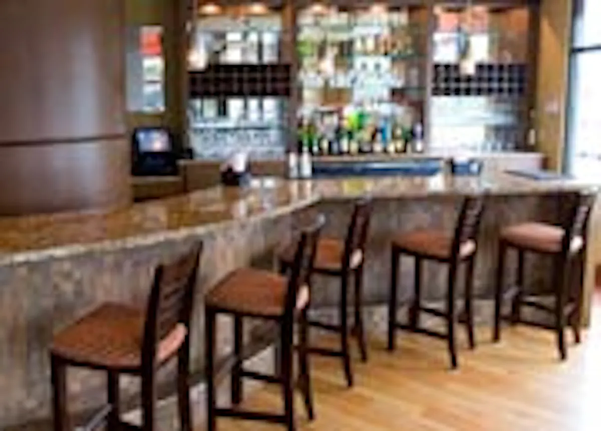 a kitchen with a dining table