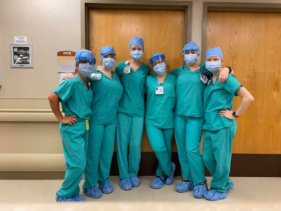 a group of people posing for a photo