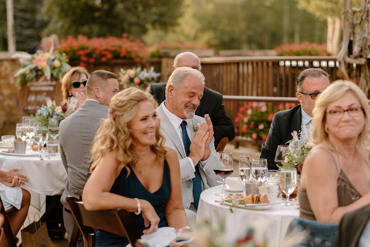a group of people sitting at a table