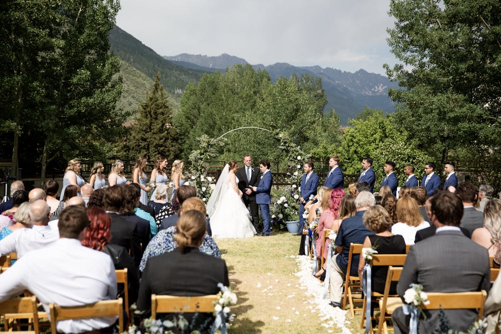 a group of people sitting in front of a crowd