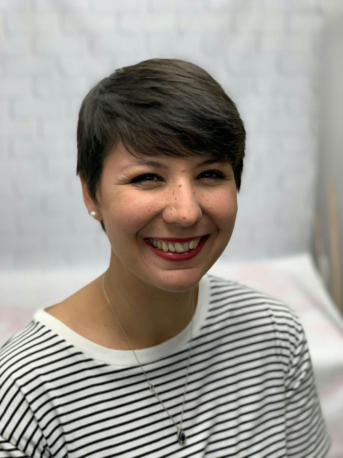 a woman smiling for the camera