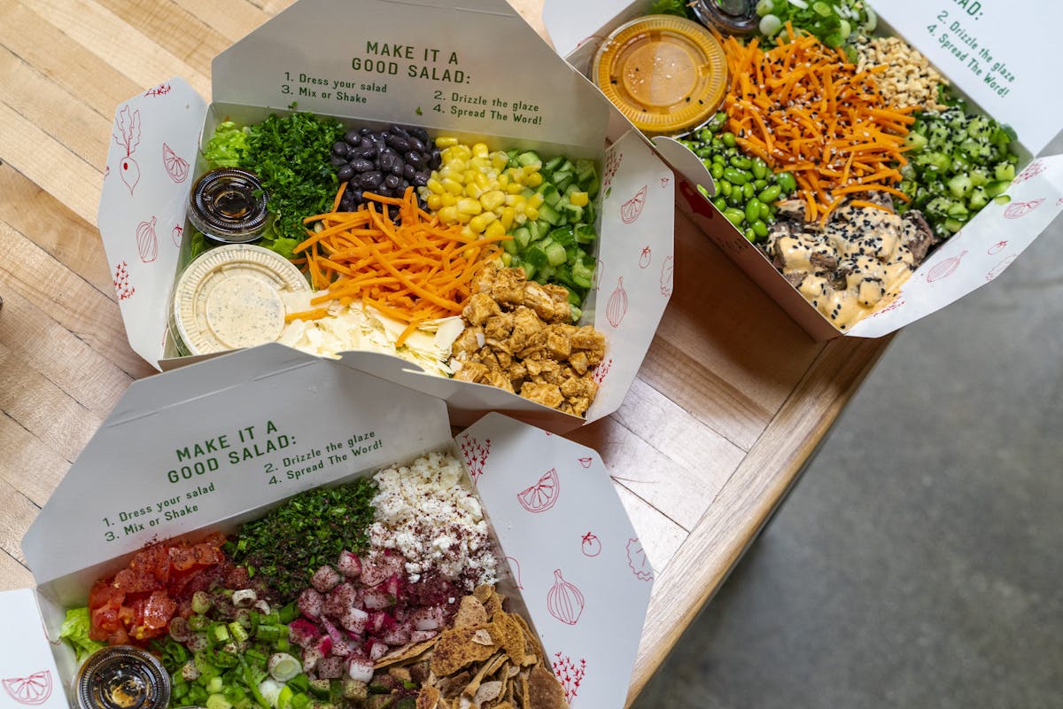 a box filled with different types of food on a table