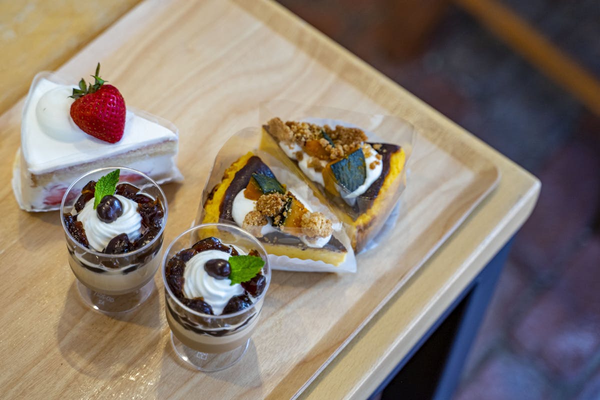 a piece of cake sitting on top of a wooden table
