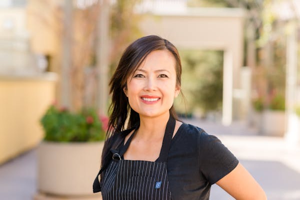 a woman smiling for the camera