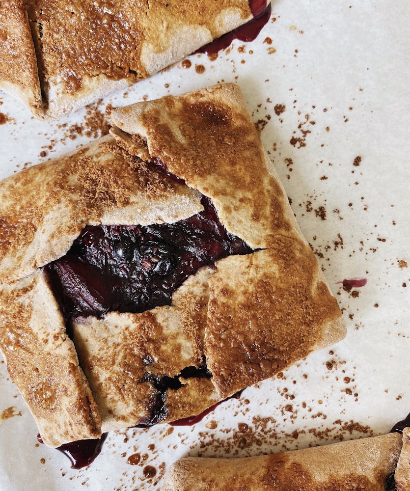a piece of cake and ice cream on a plate