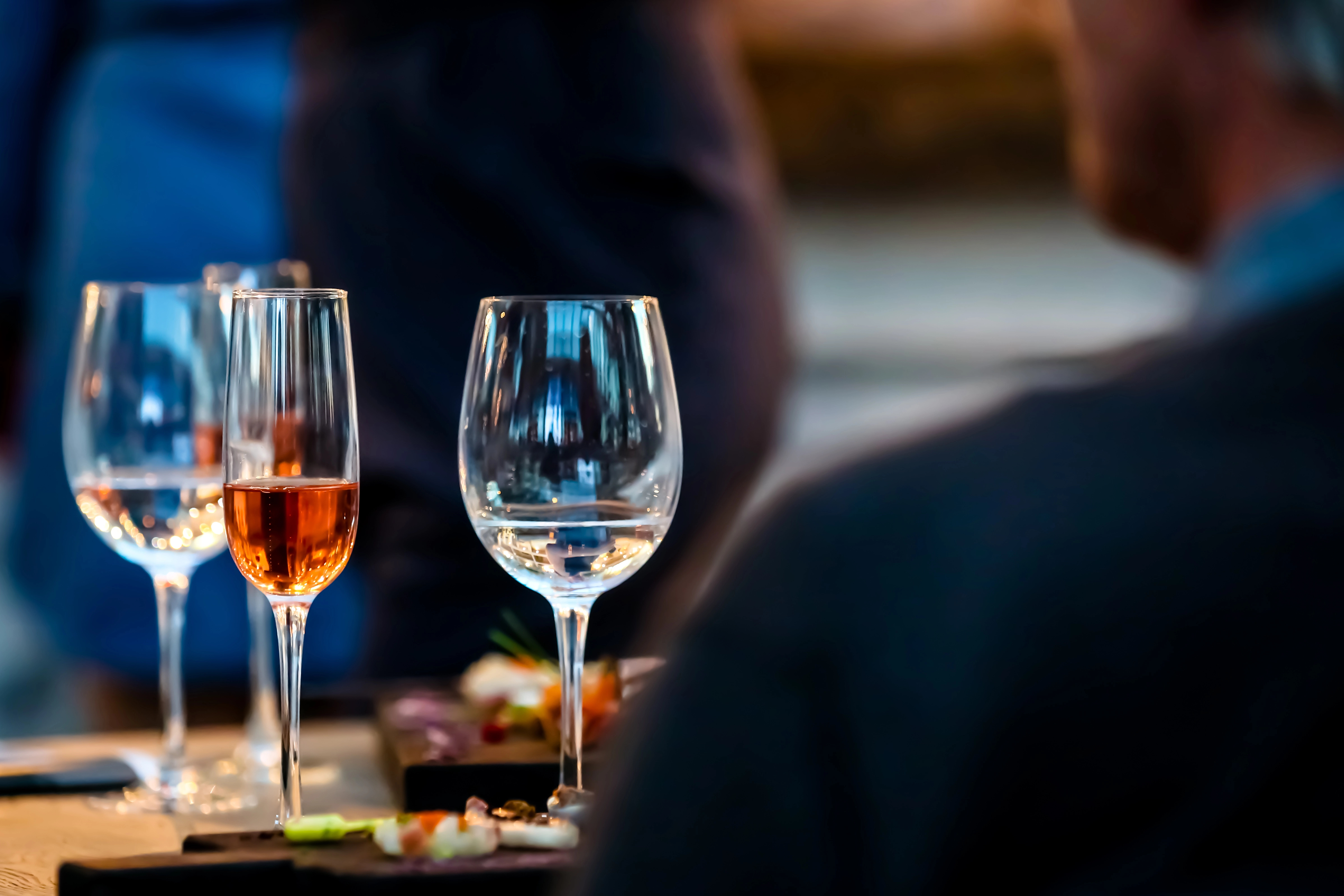 a couple of wine glasses on a table