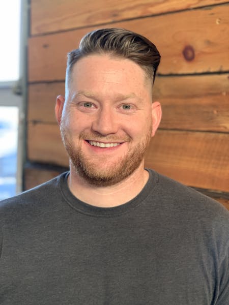 a man smiling for the camera