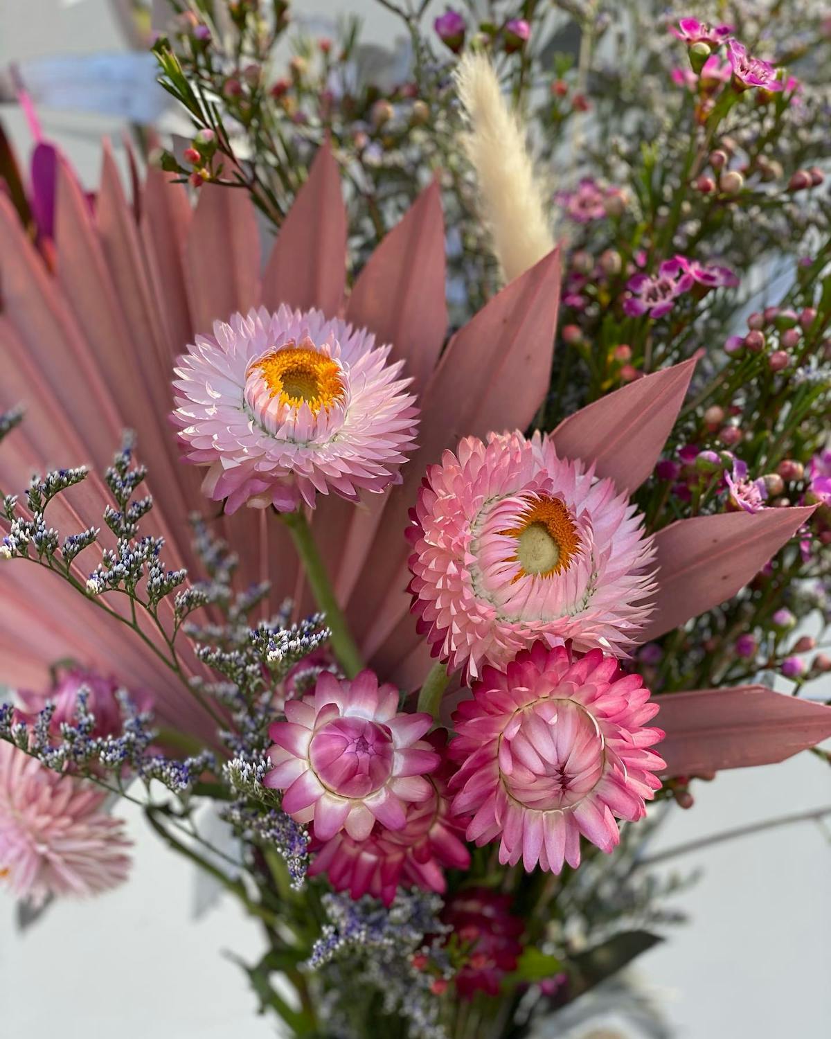a vase filled with pink flowers