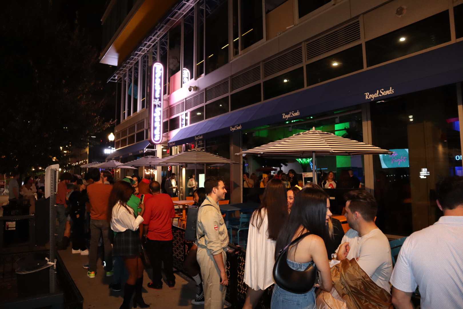 a group of people standing in front of a crowd