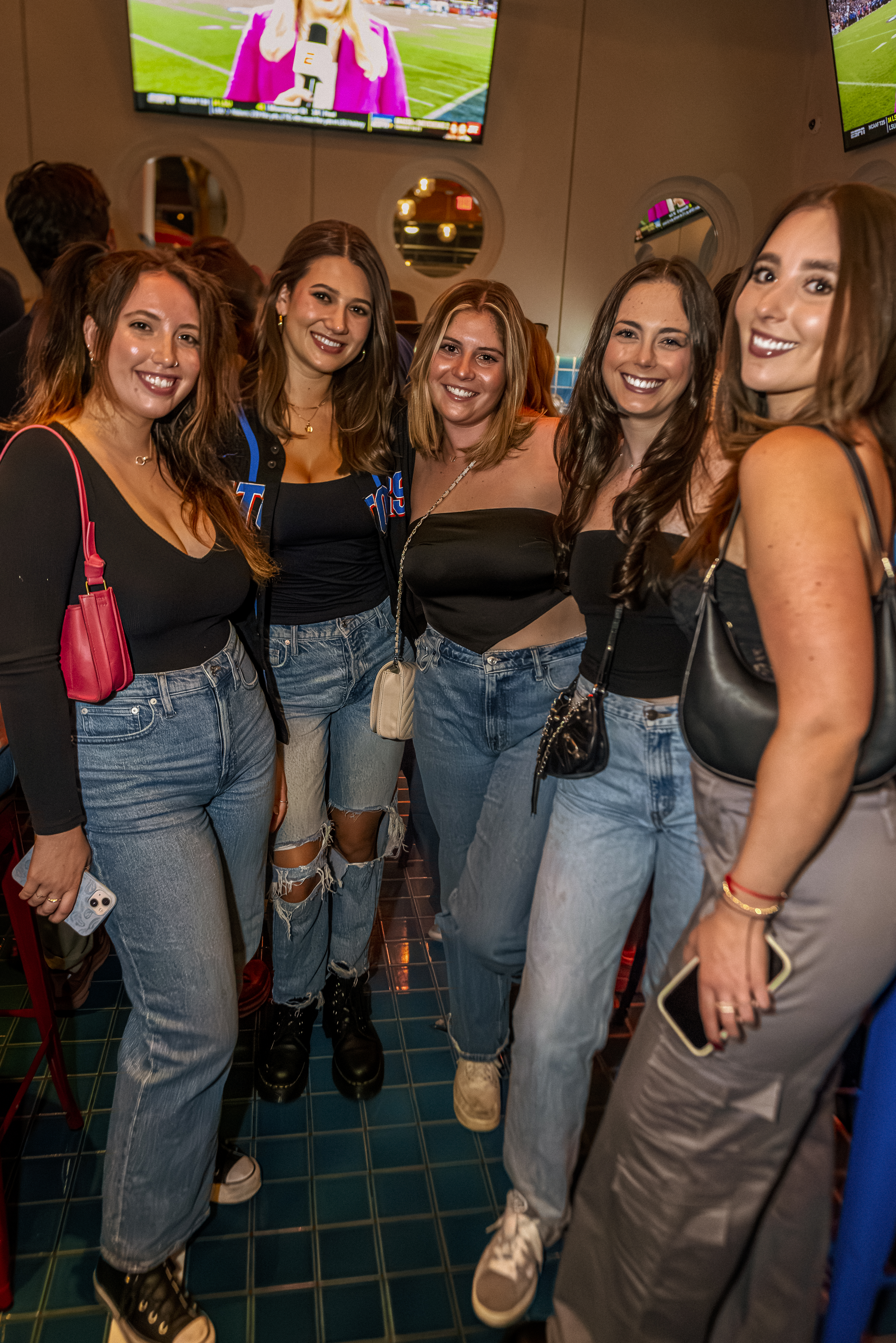 a group of people posing for the camera