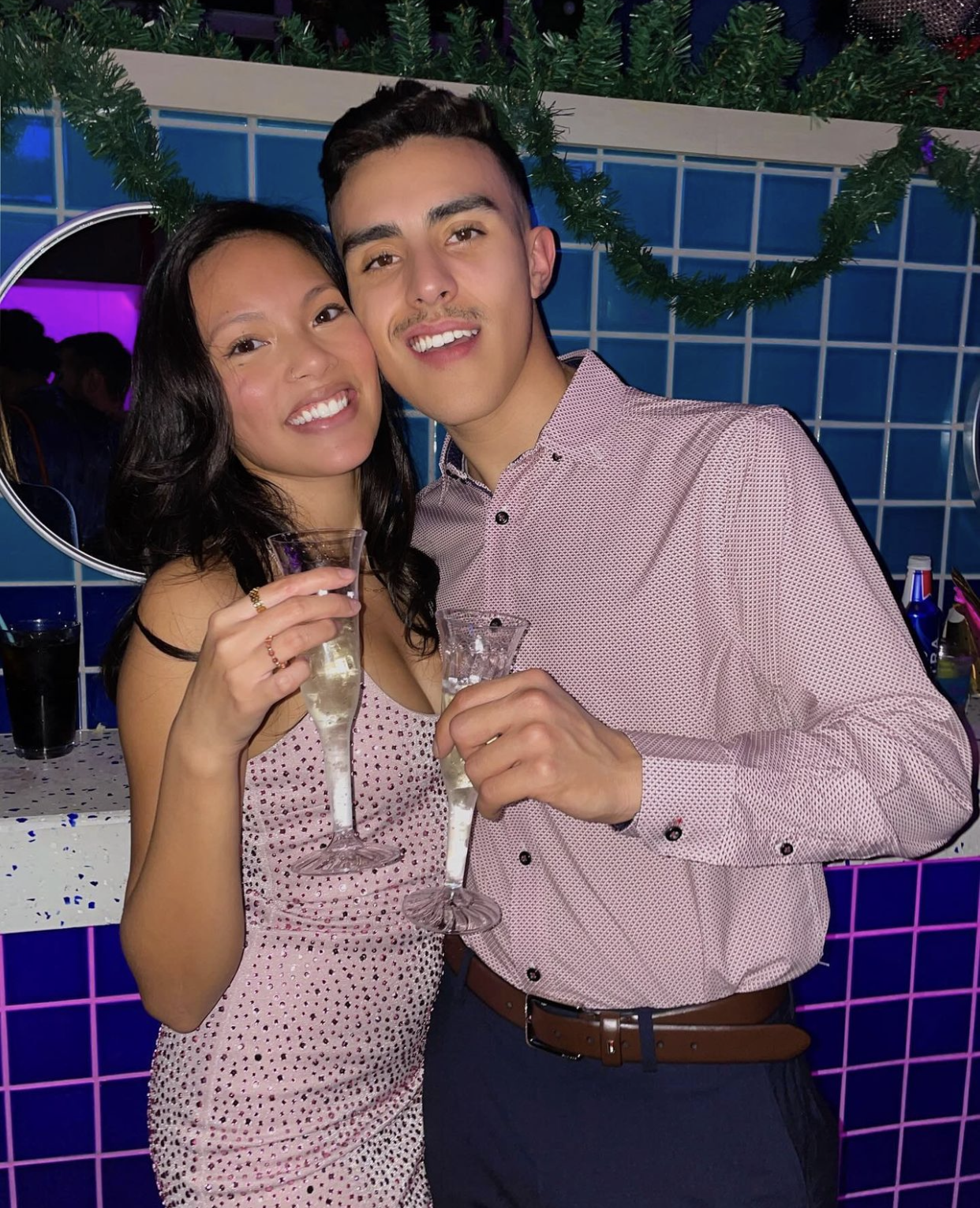 a couple of people posing for the camera