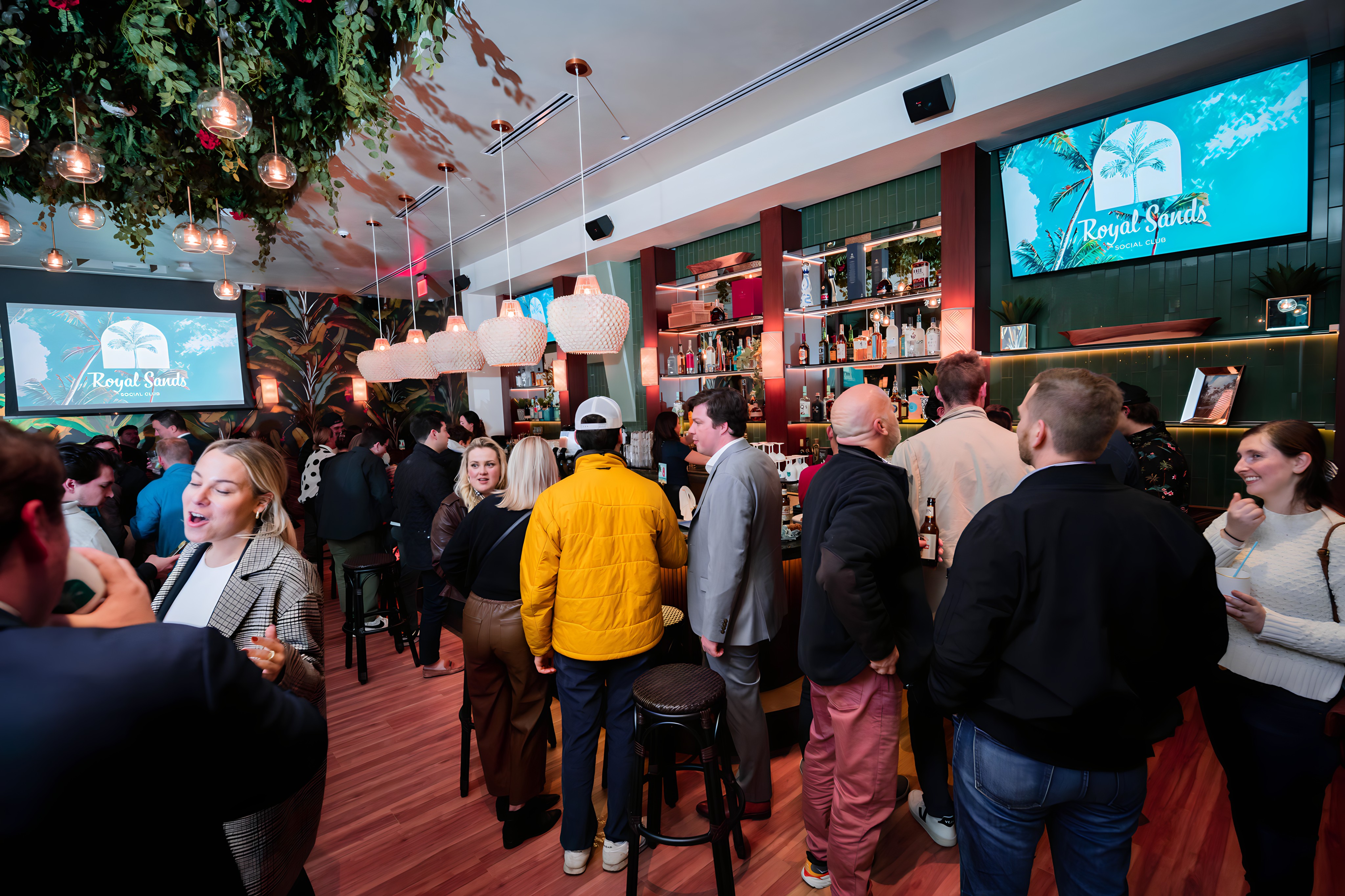 a group of people standing in front of a crowd