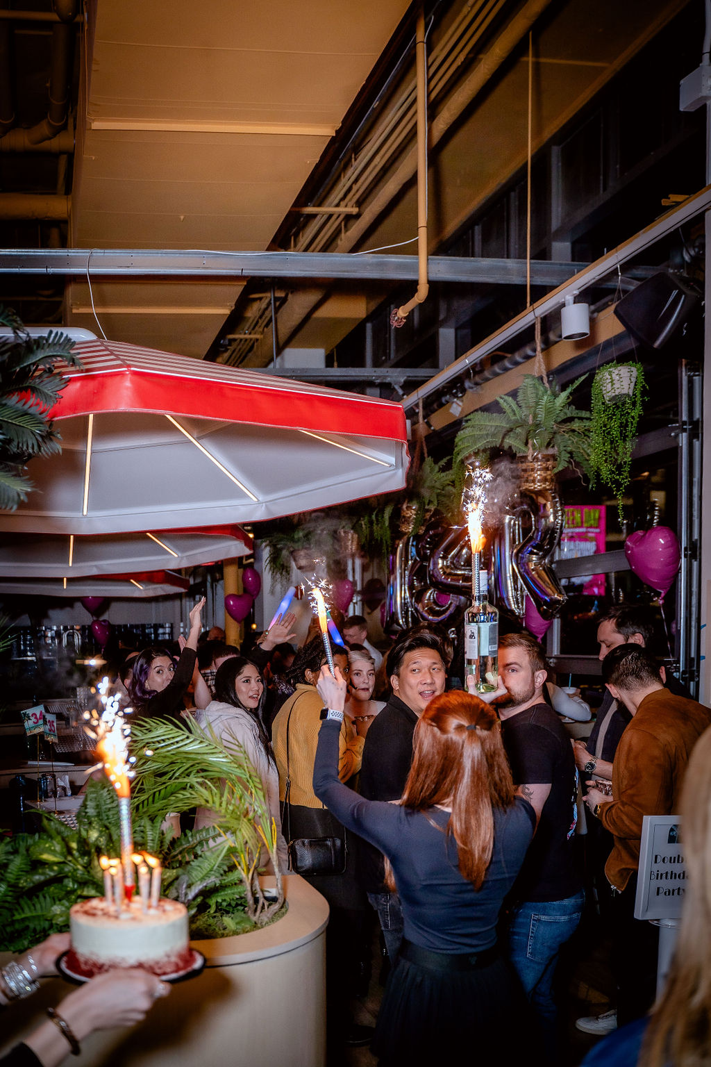 a group of people standing in front of a building