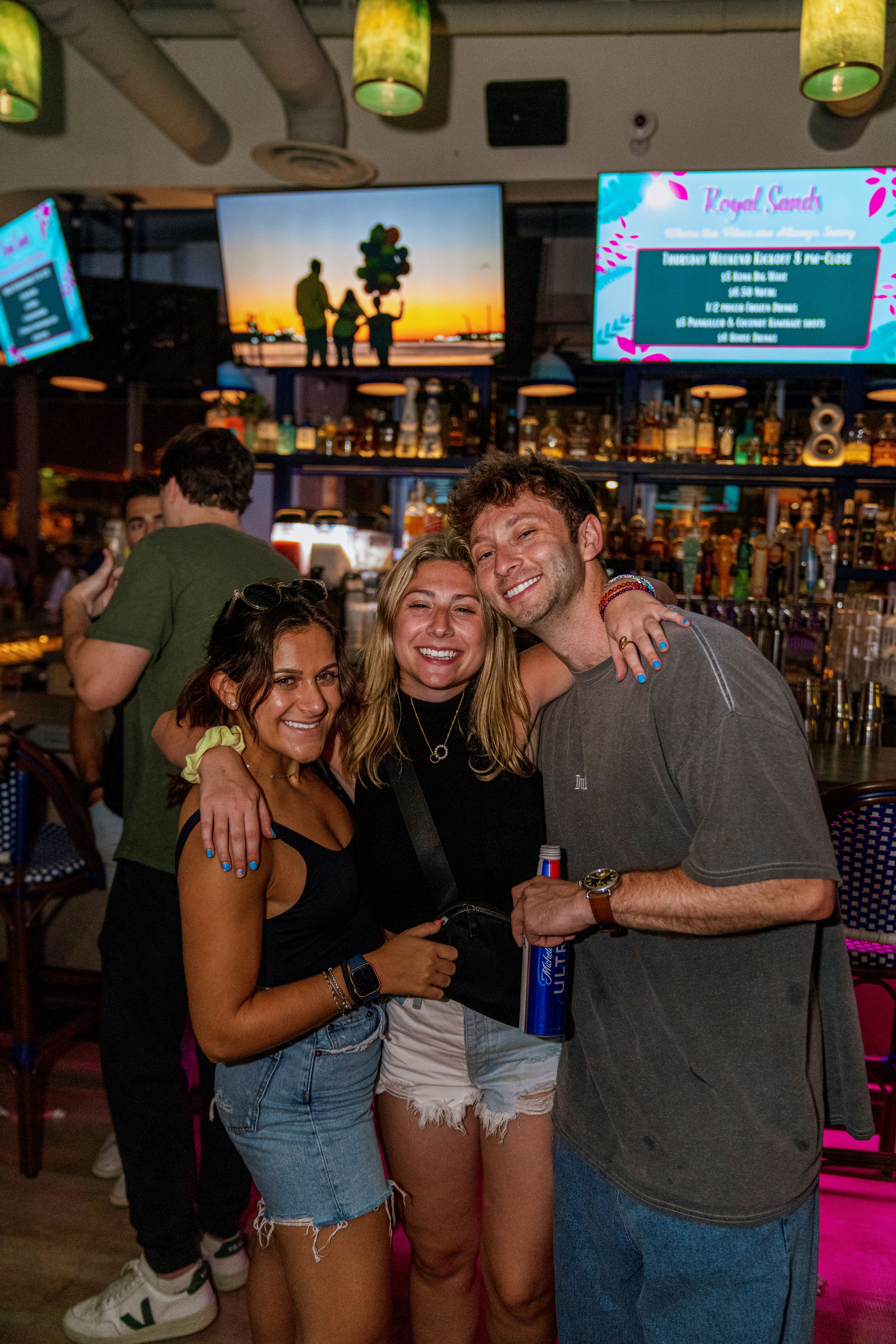 a group of people posing for the camera