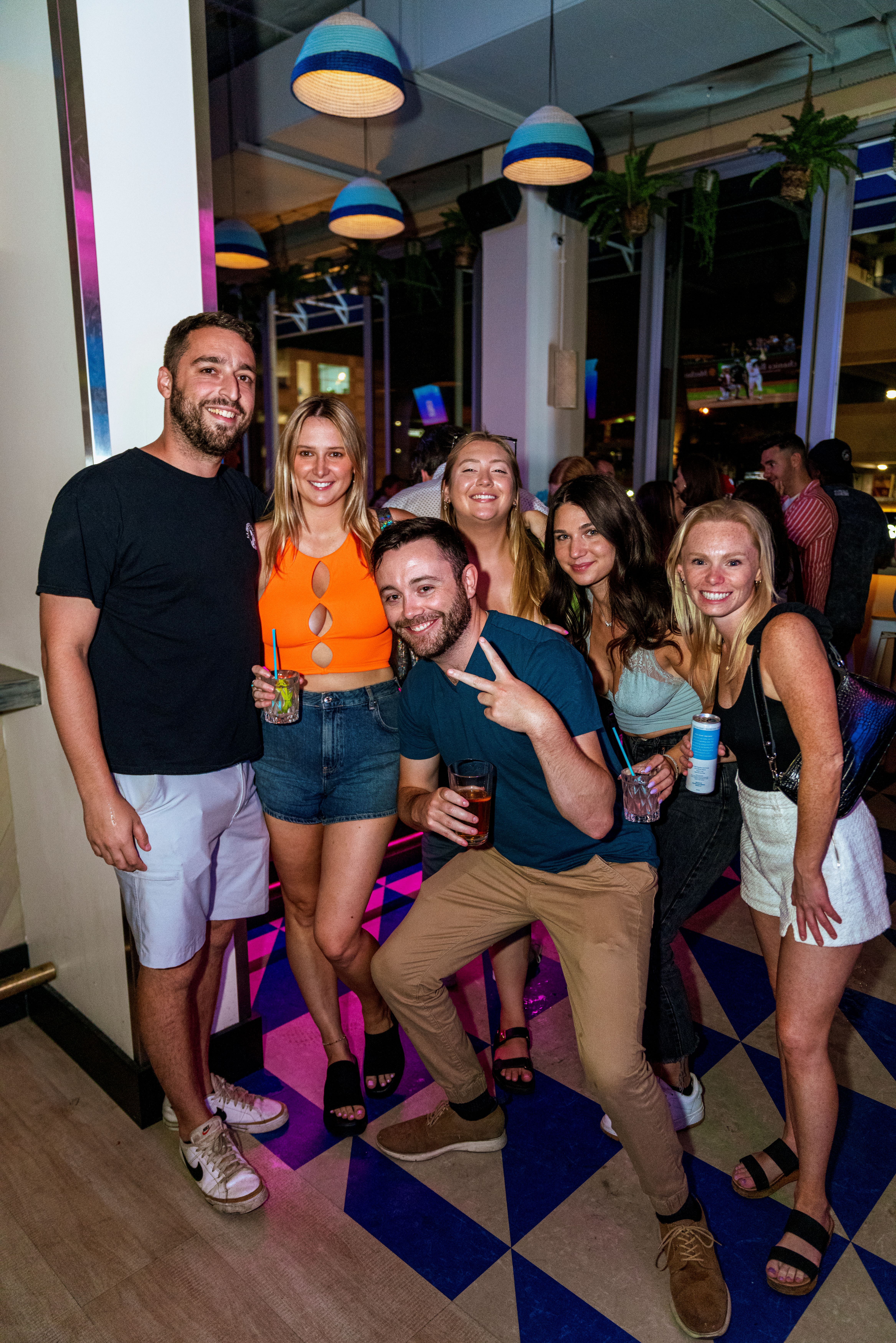 a group of people posing for the camera