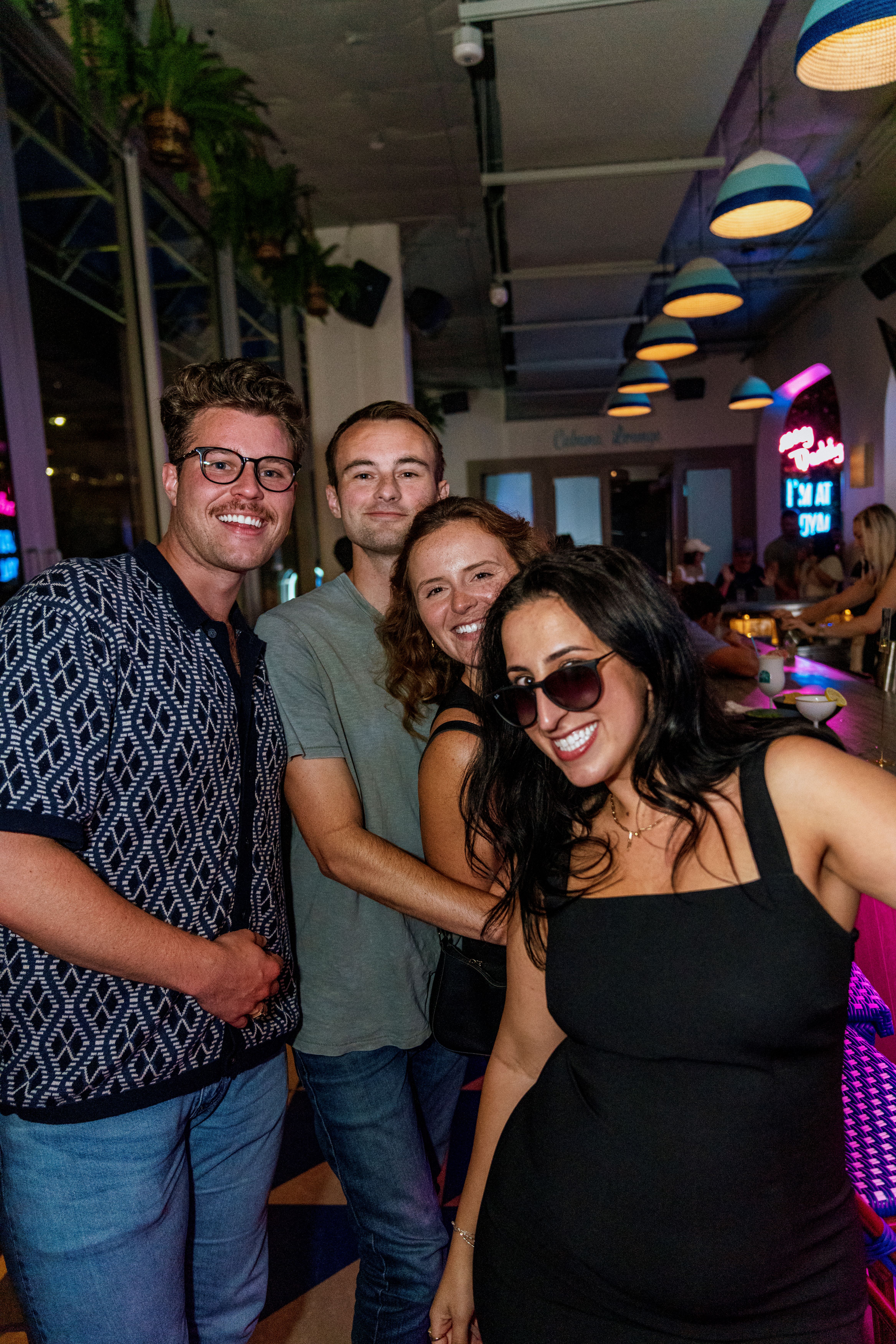 a group of people posing for the camera