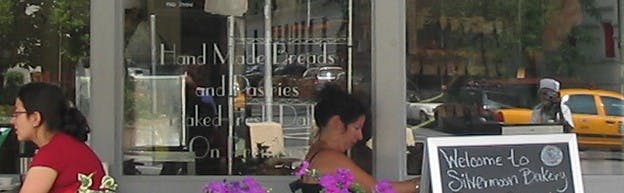 a person standing in front of a store
