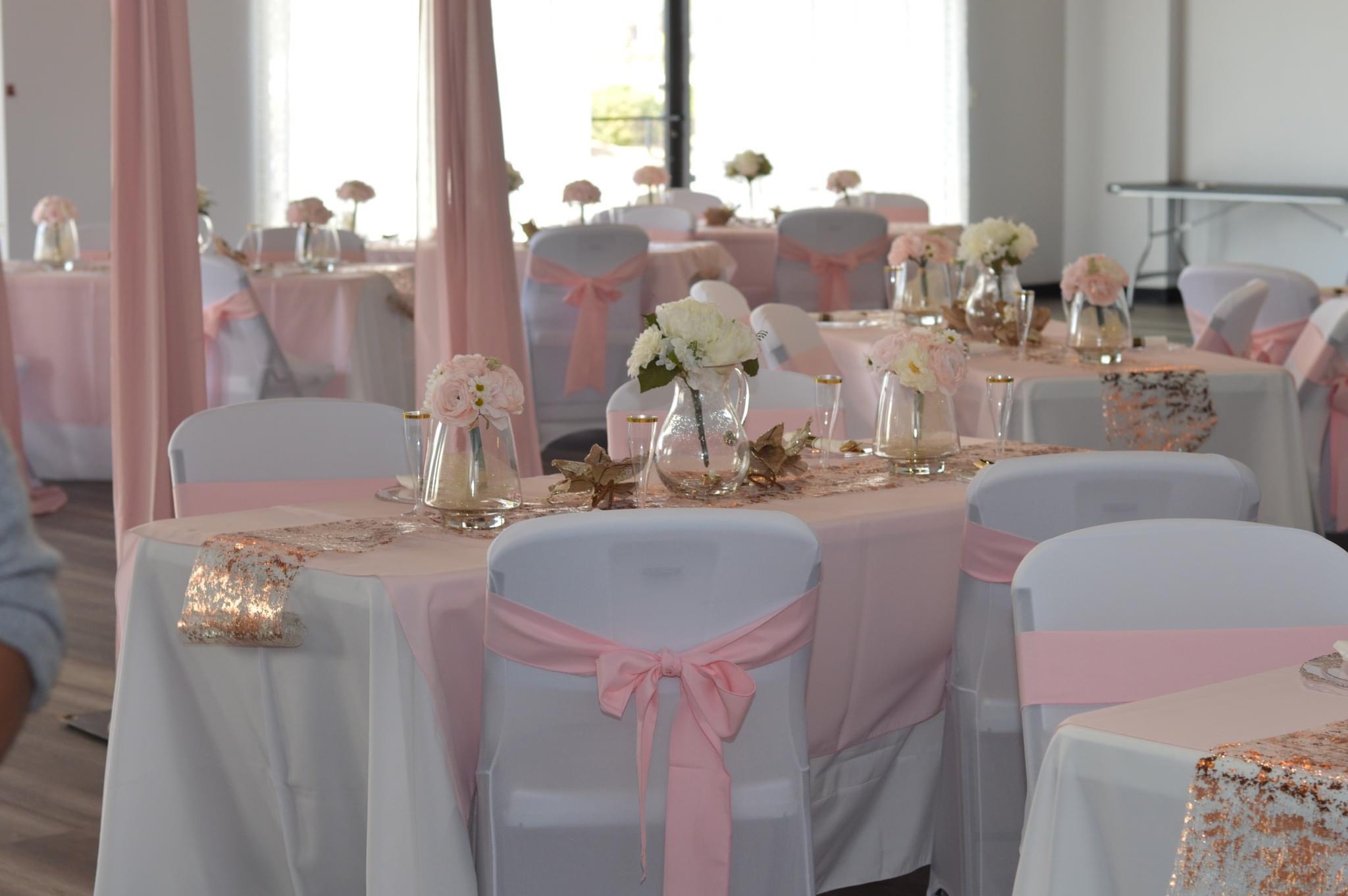 a group of pink tub and sink