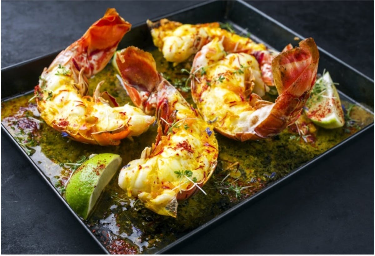 a lobster sitting on top of a table