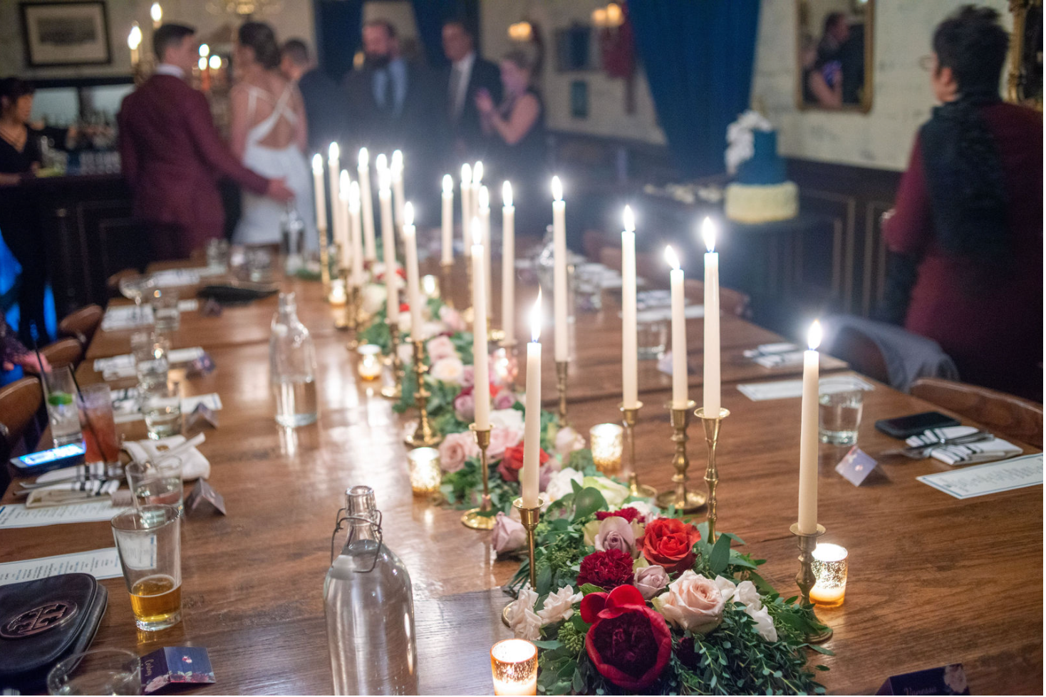 a group of people sitting at a table with wine glasses