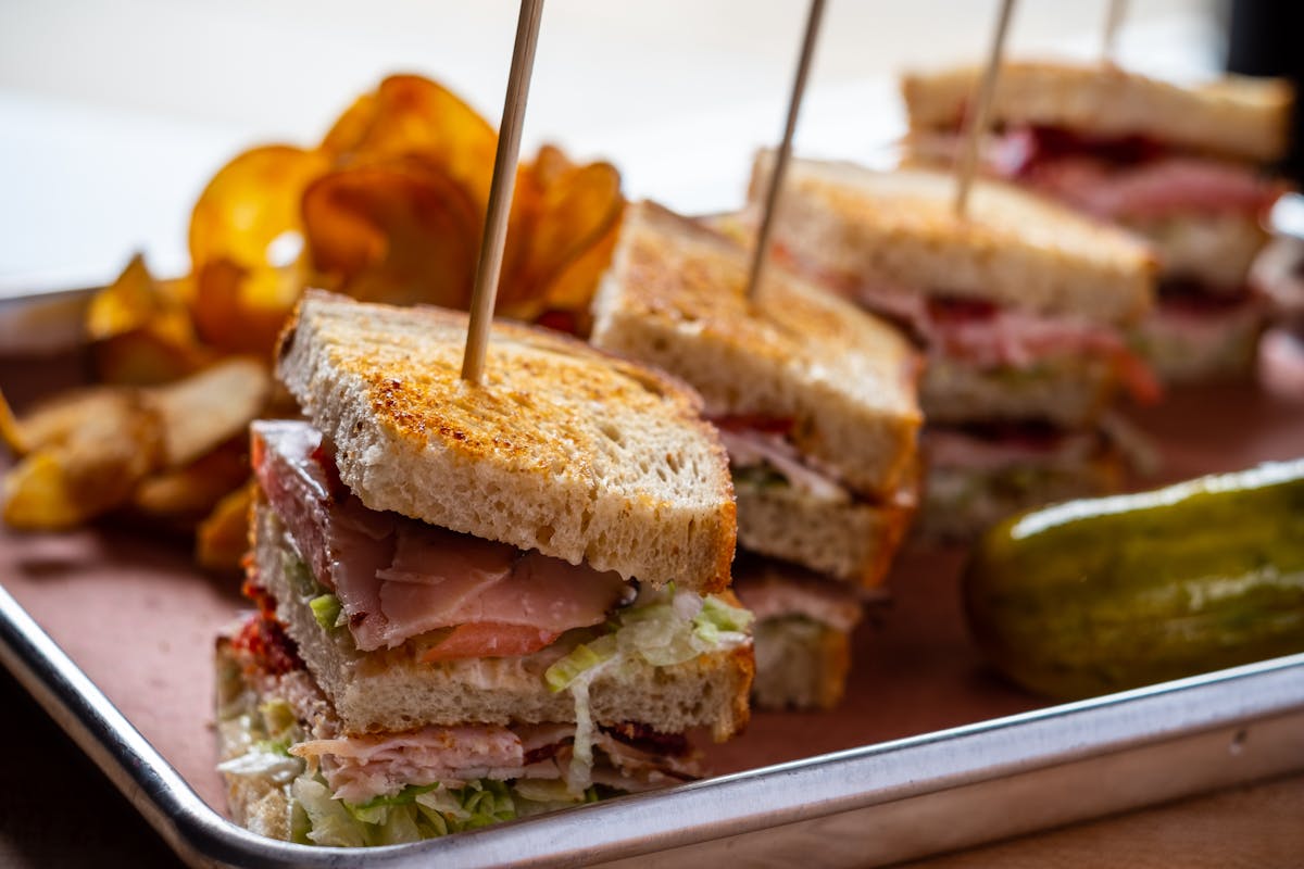 a sandwich cut in half on a plate