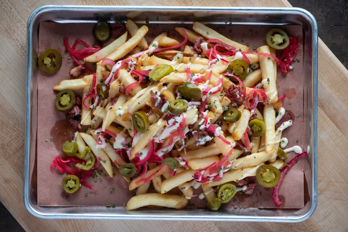 a box filled with different types of food on a tray