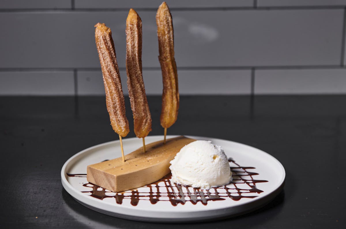 churros served with ice cream