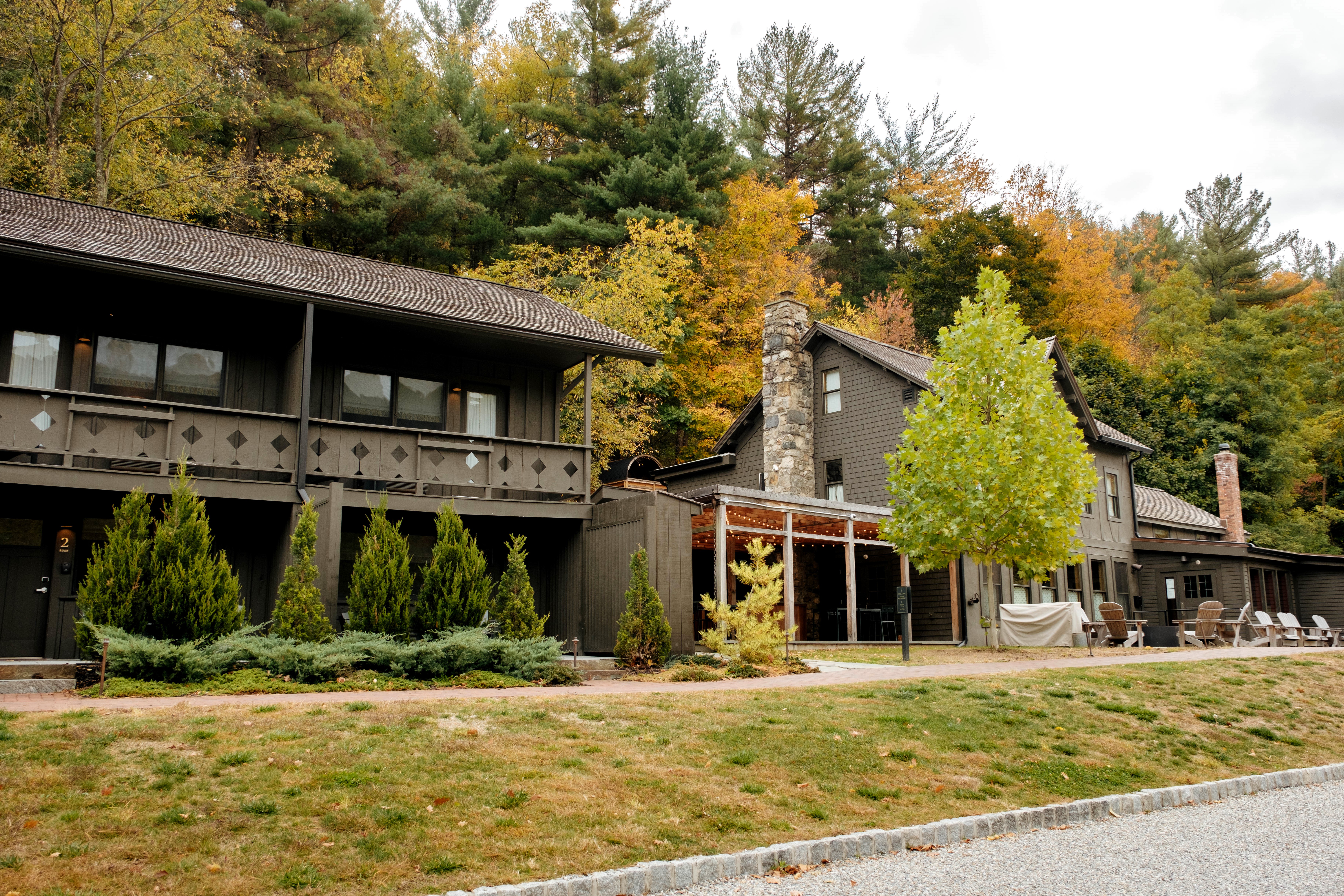 a house with trees in the background