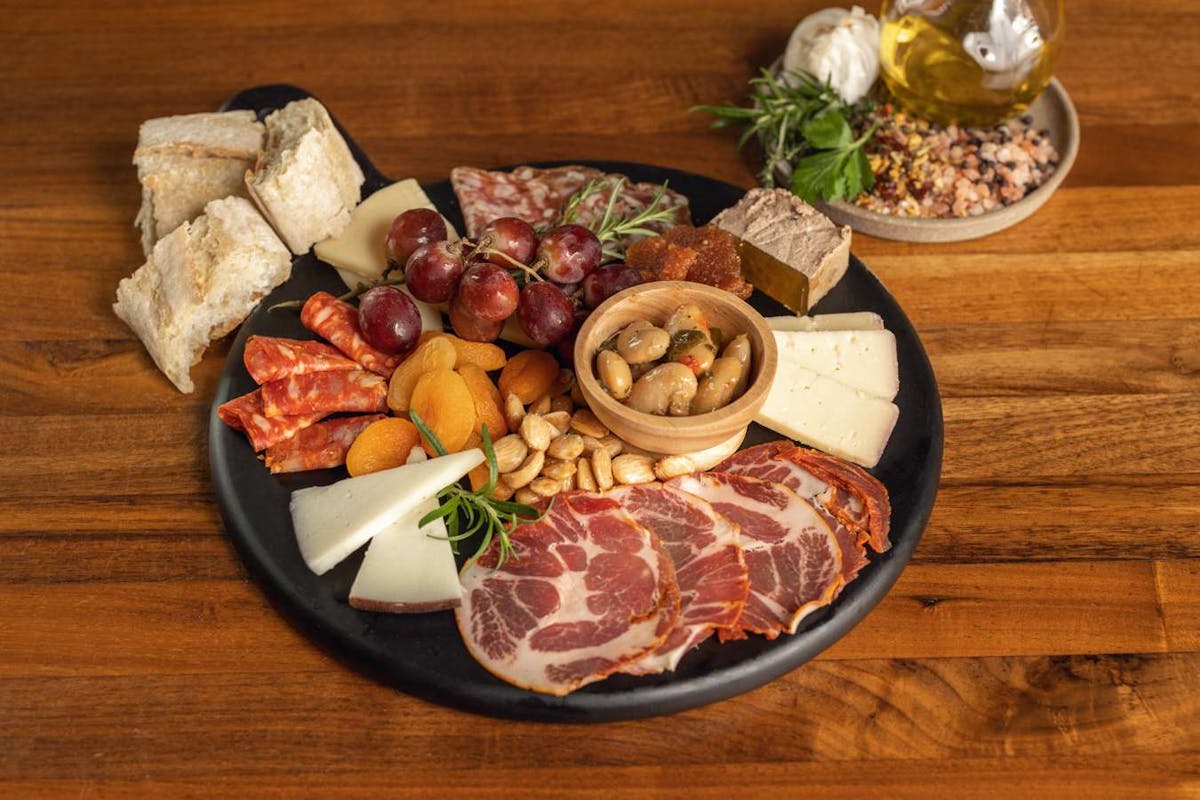 a plate of food on a wooden table